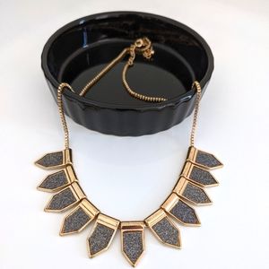 Charcoal/gold necklace.